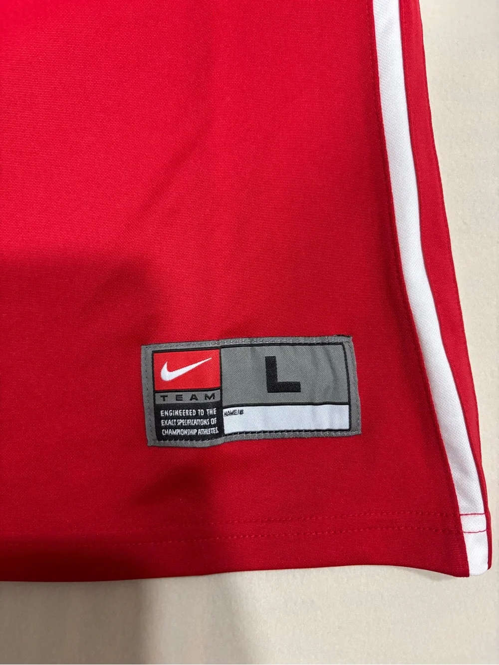 Nike women’s Red Athletic Crew Tee with White Sleeve Detail